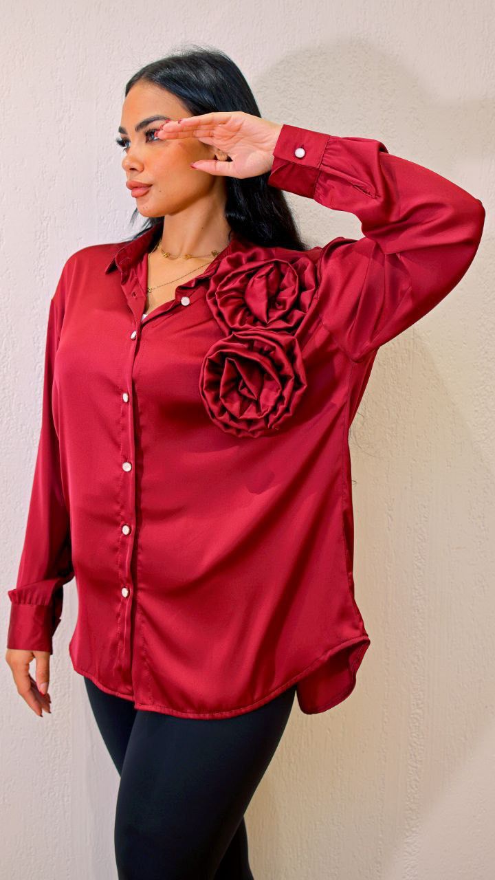 Soft satin shirt featuring a stylish flower accent