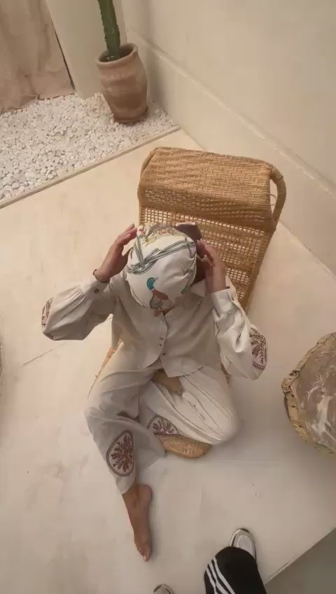 Just the shirt’s simplicity and the embroidery’s grace