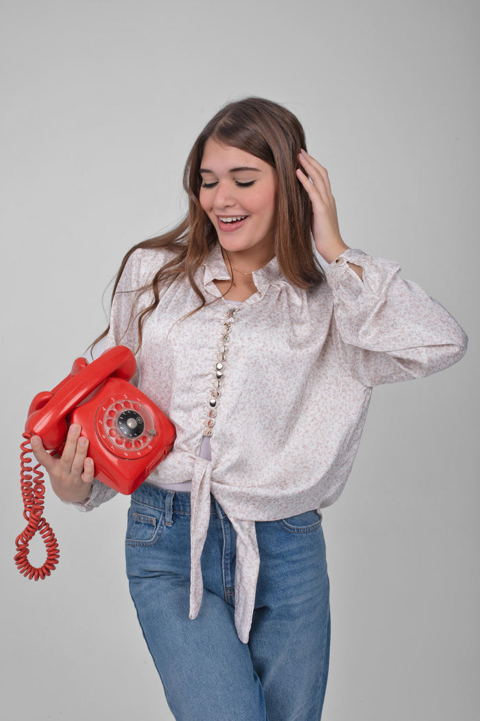 A timeless satin blouse with a modern twist