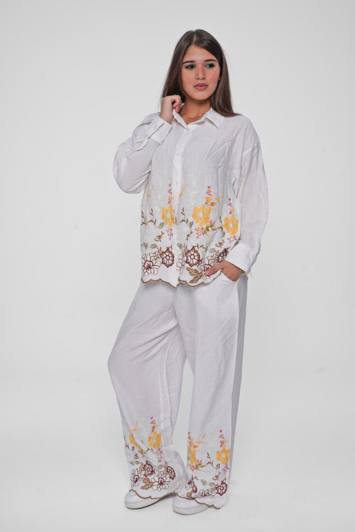 Elegant linen suit with delicate embroidery for a luxurious touch