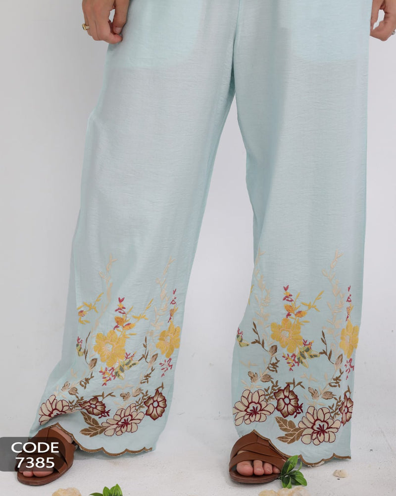 Elegant linen suit with delicate embroidery for a luxurious touch