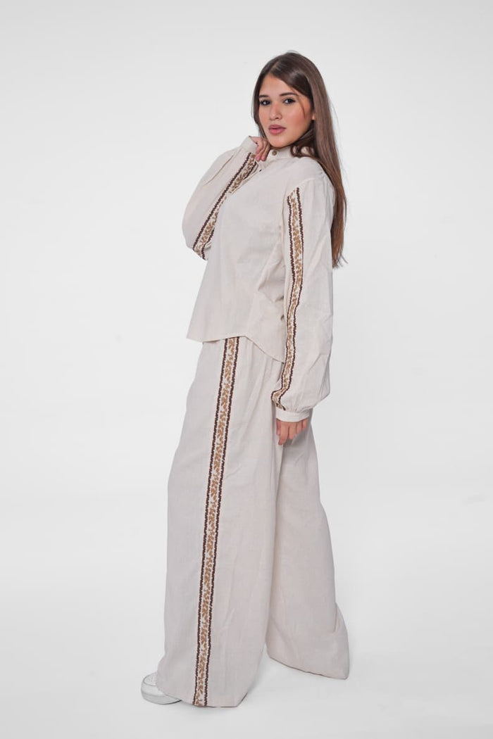 Step out in elegance with our Embroidered Linen Suit