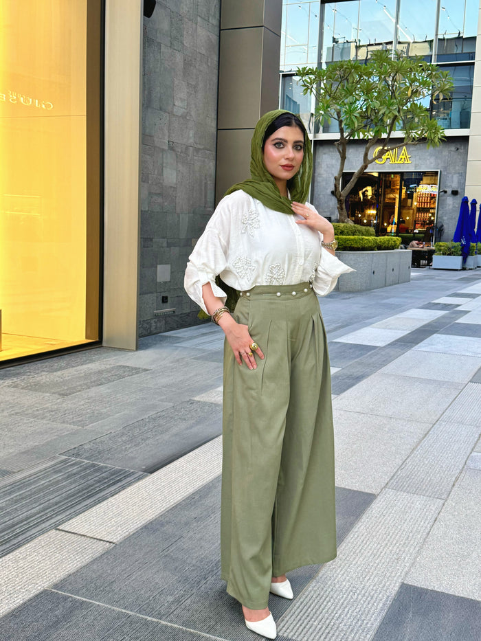 Step into timeless elegance with our plain pleated pants