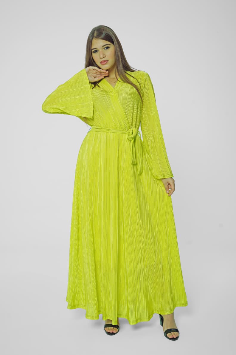 Stay stylish and comfortable in this flowy pleated dress