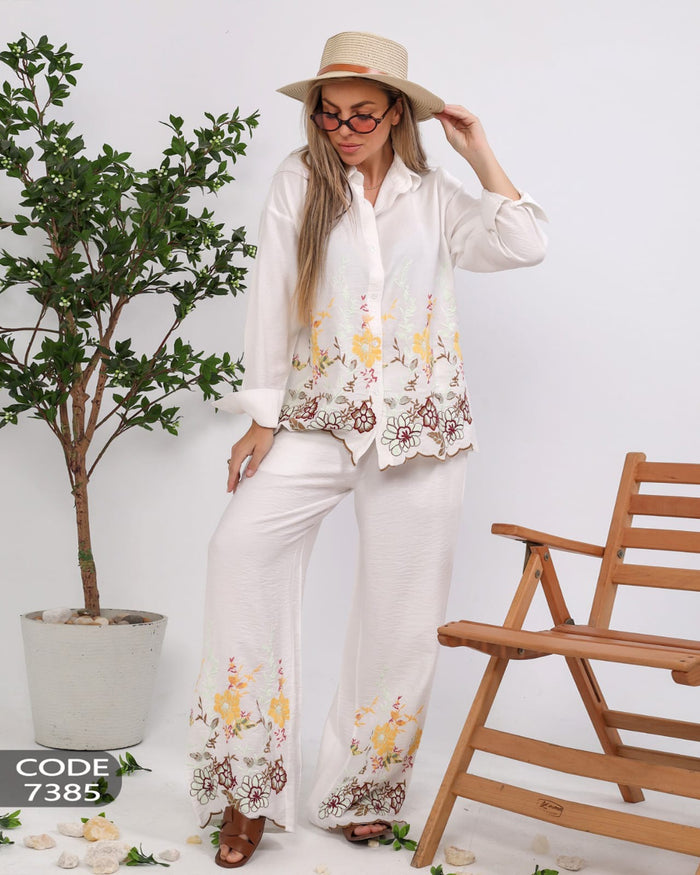 Elegant linen suit with delicate embroidery for a luxurious touch