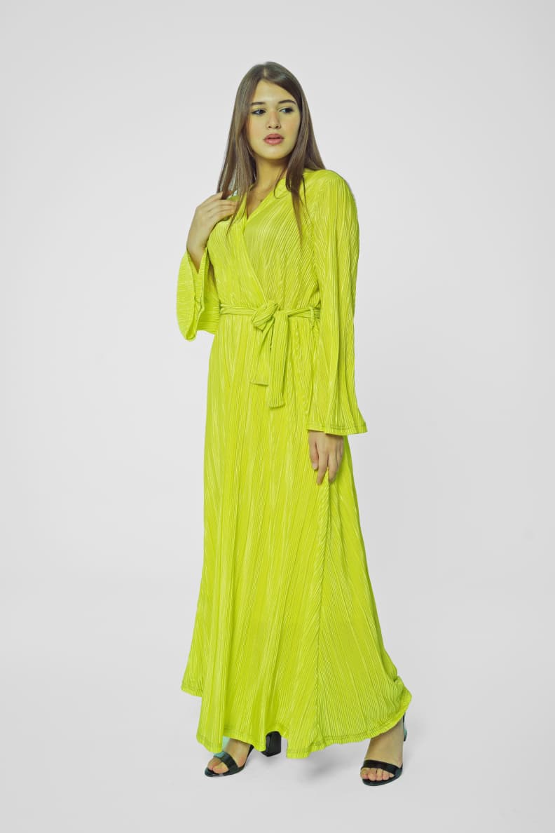 Stay stylish and comfortable in this flowy pleated dress