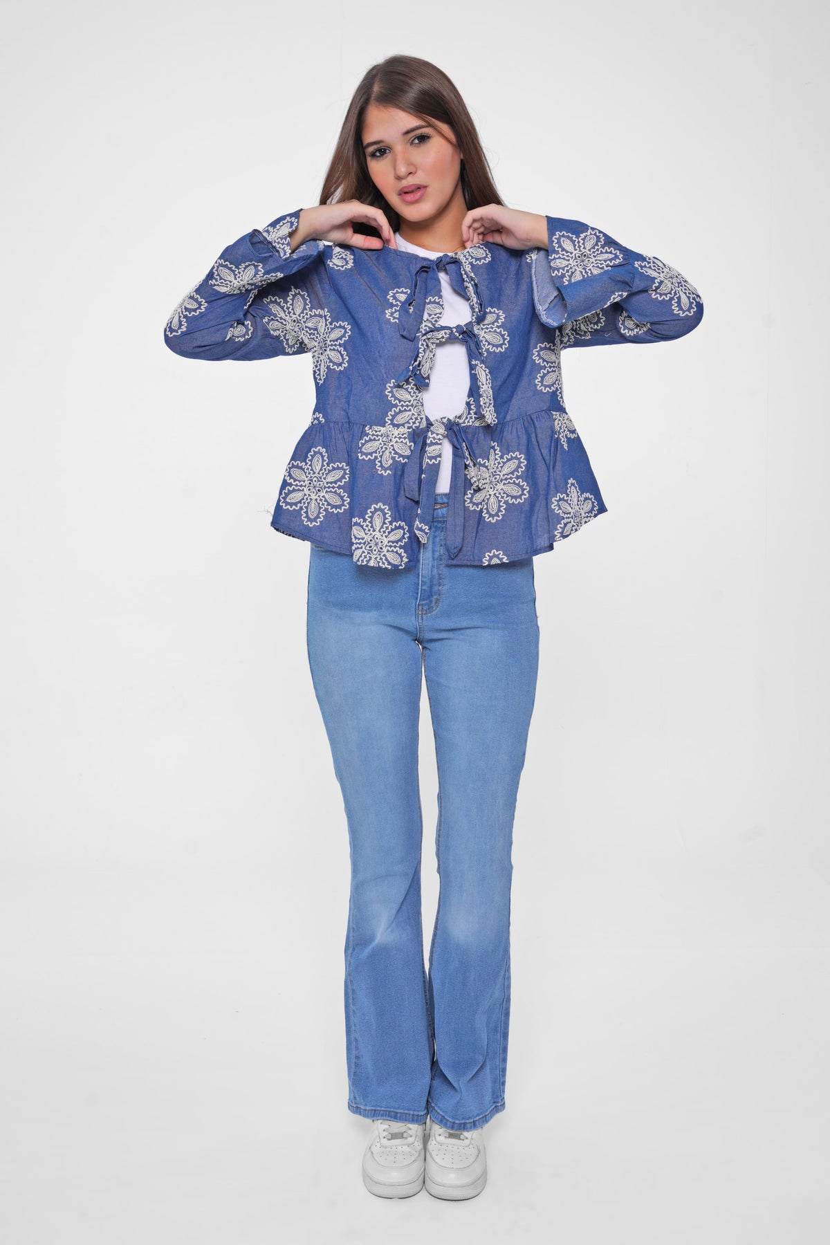 Shine in style with our Embroidered Denim Blouse