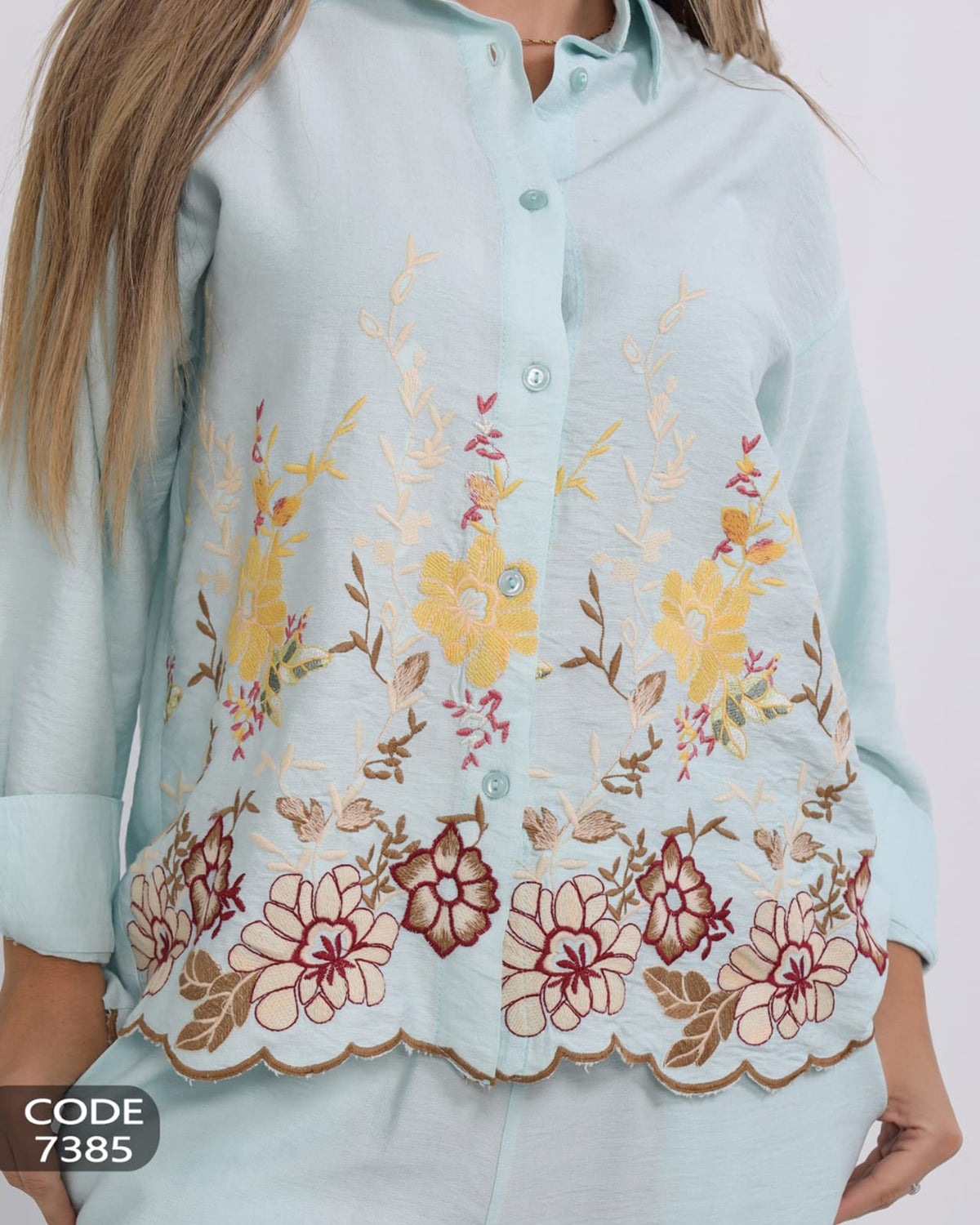Elegant linen suit with delicate embroidery for a luxurious touch