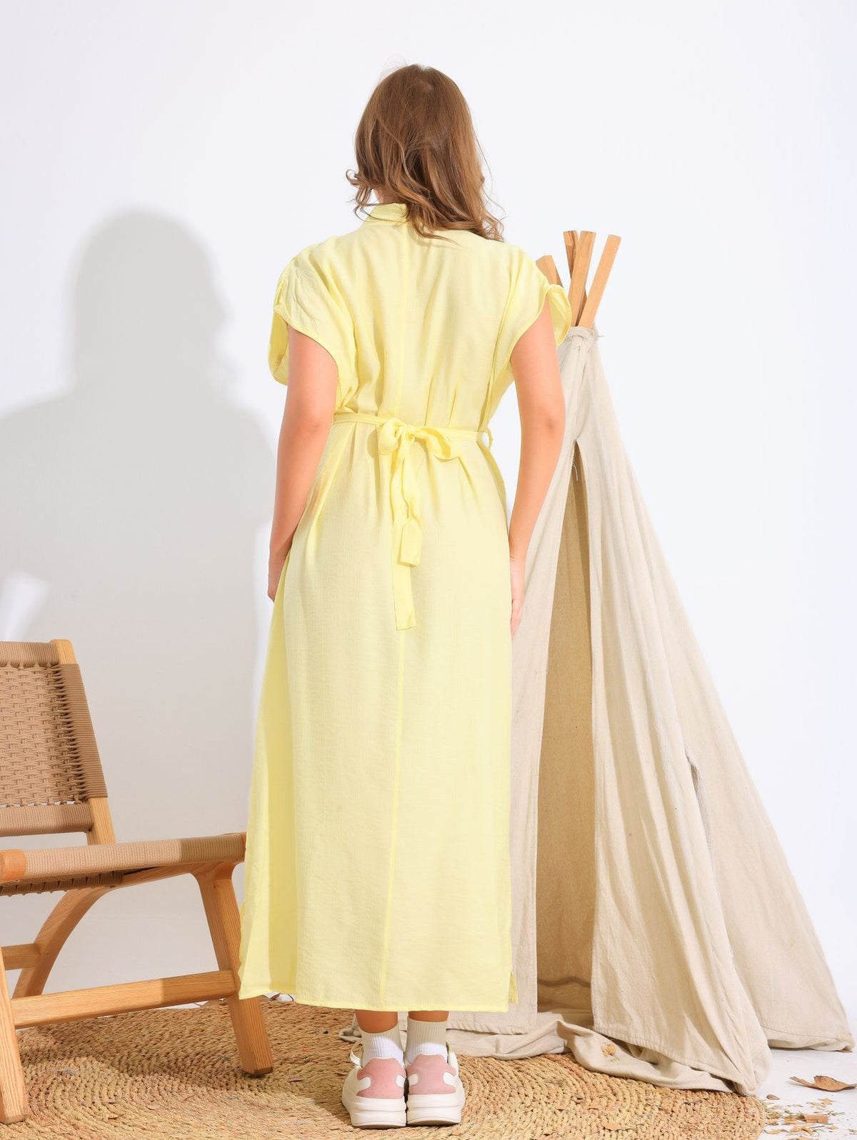 A plain belted dress that defines your waist beautifully