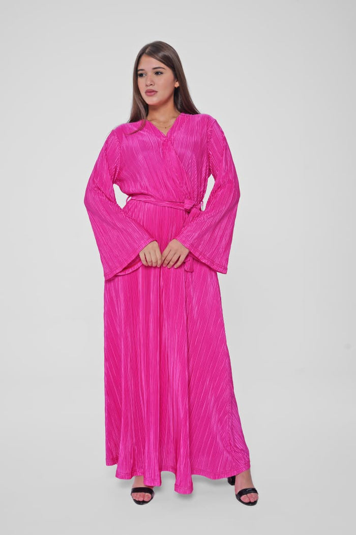 Stay stylish and comfortable in this flowy pleated dress