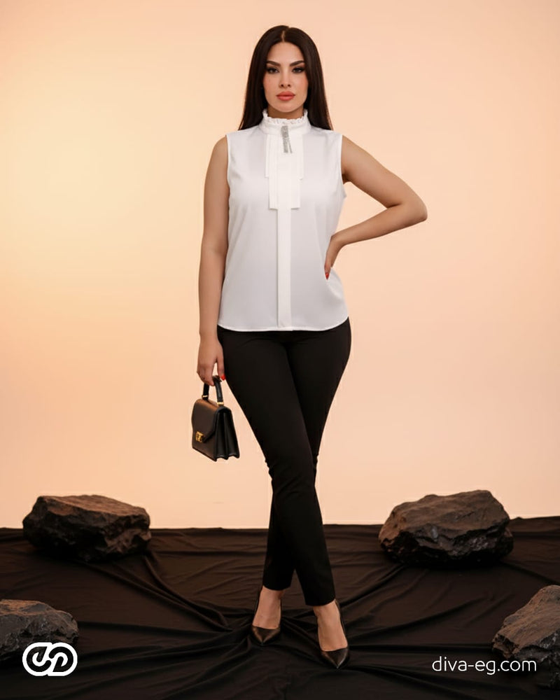 Add a feminine touch with this ruffled blouse
