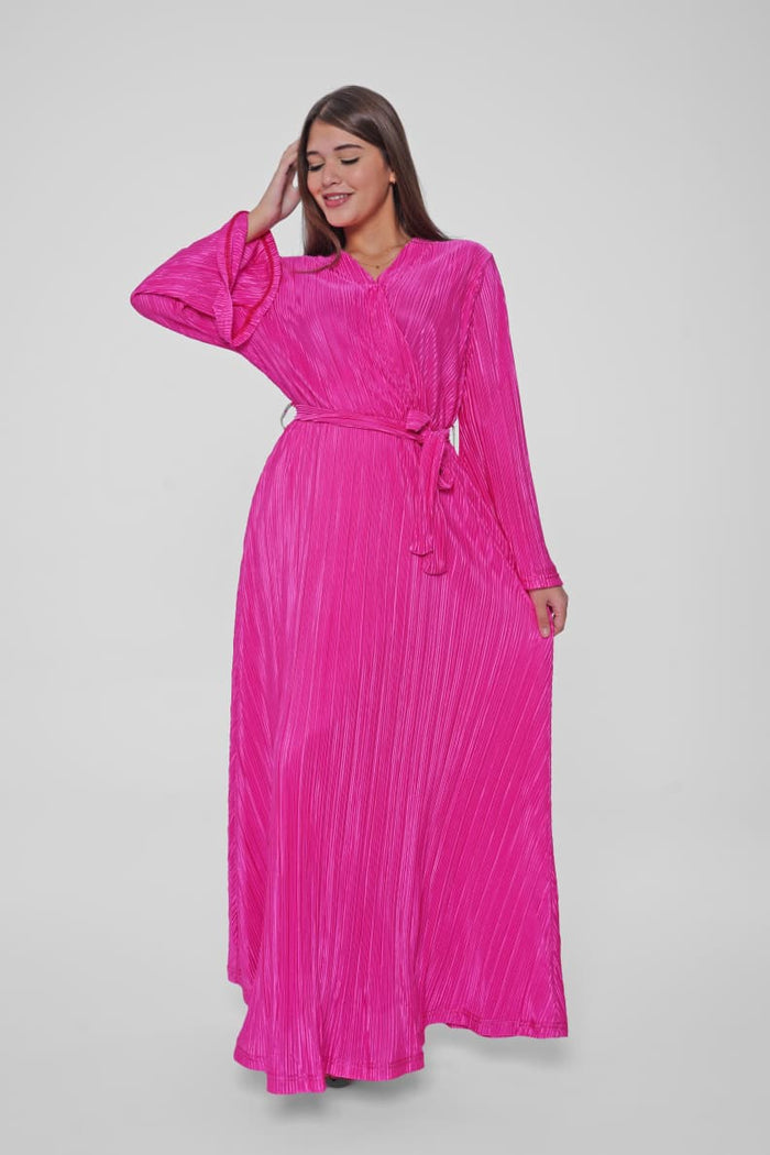 Stay stylish and comfortable in this flowy pleated dress