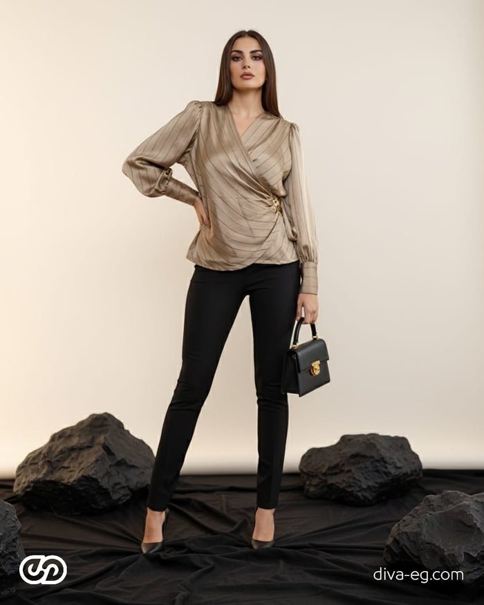 A striped satin blouse that adds effortless elegance