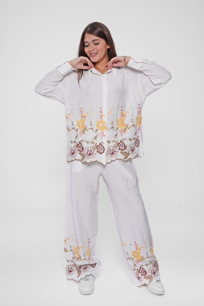 Elegant linen suit with delicate embroidery for a luxurious touch