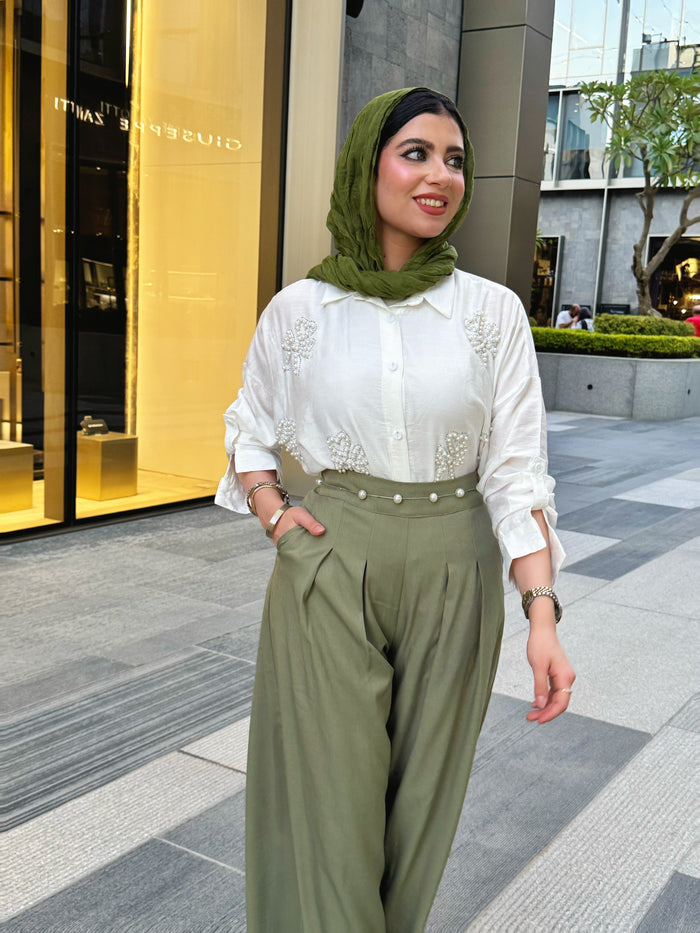 Step into timeless elegance with our plain pleated pants