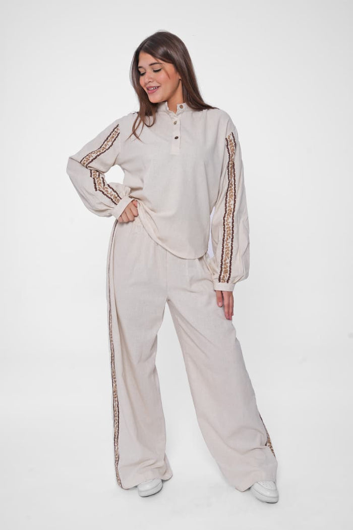 Step out in elegance with our Embroidered Linen Suit