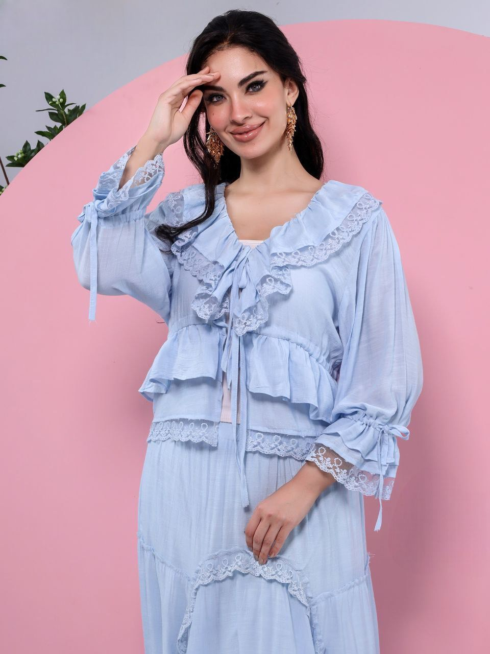 A plain suit with delicate guipure lace details.