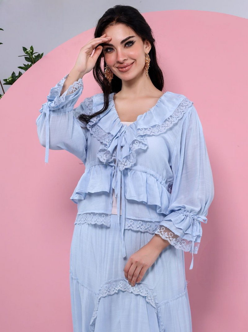 A plain suit with delicate guipure lace details.