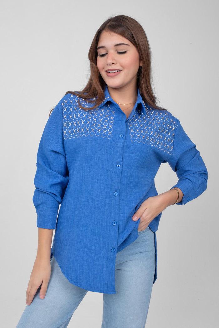 A timeless linen shirt elevated with rhinestone details