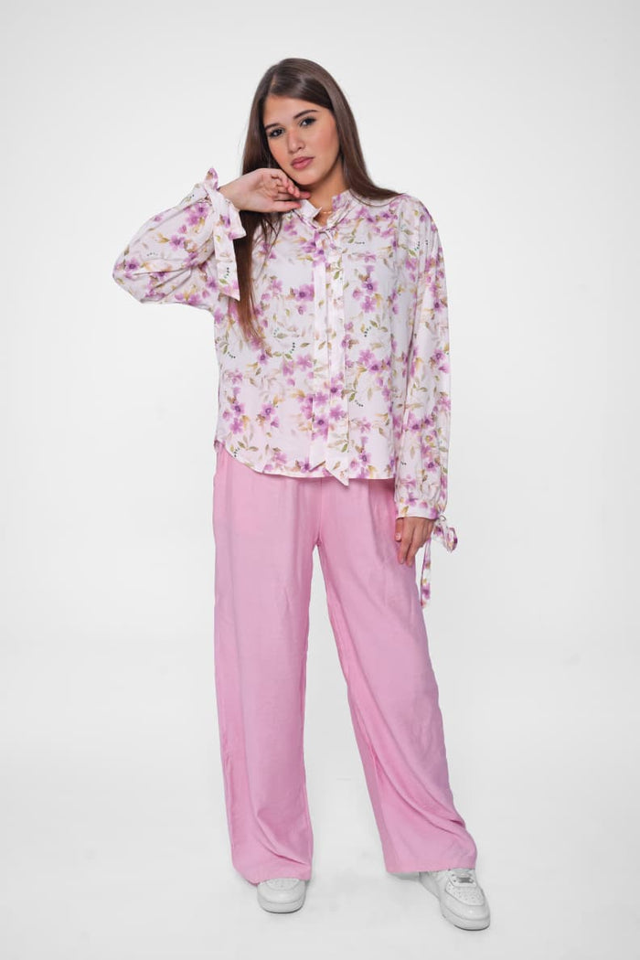 Flawless prints meet satin luxury in one blouse