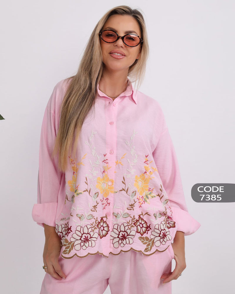 Elegant linen suit with delicate embroidery for a luxurious touch