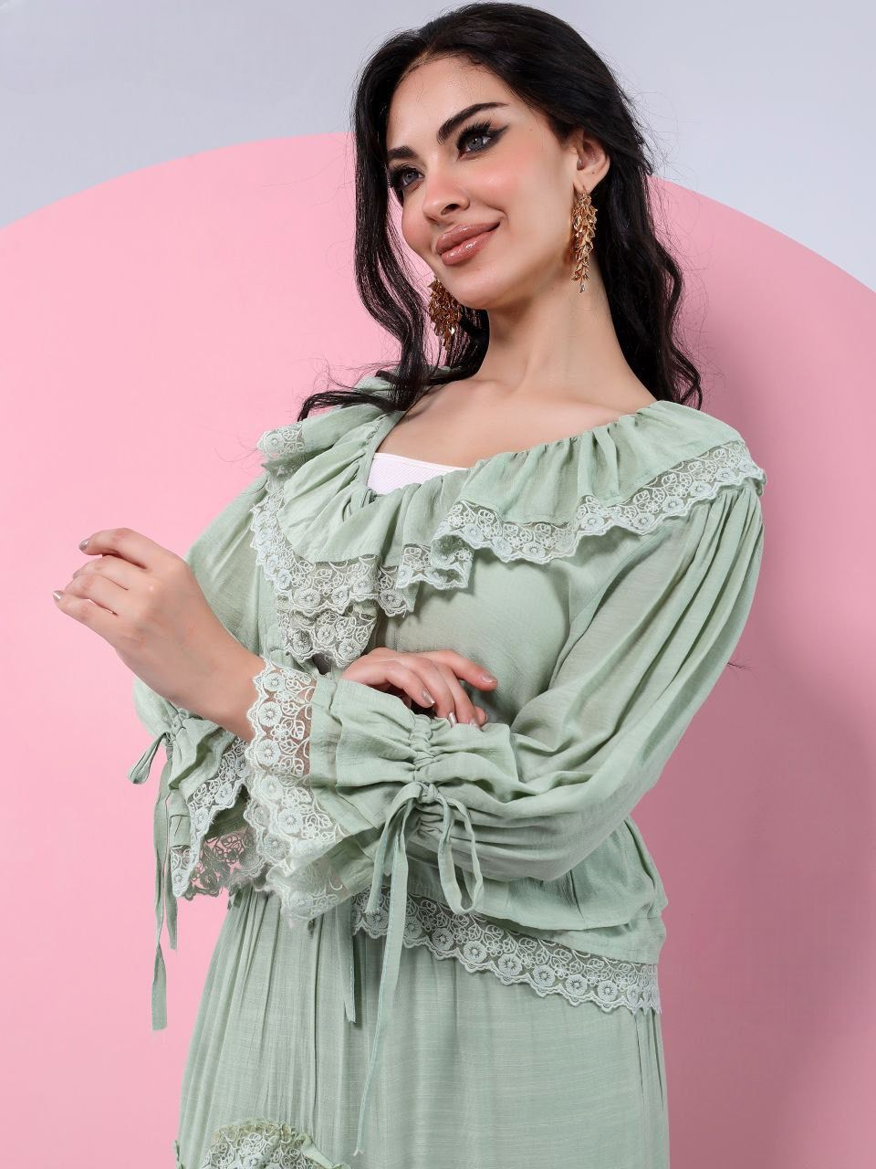 A plain suit with delicate guipure lace details.