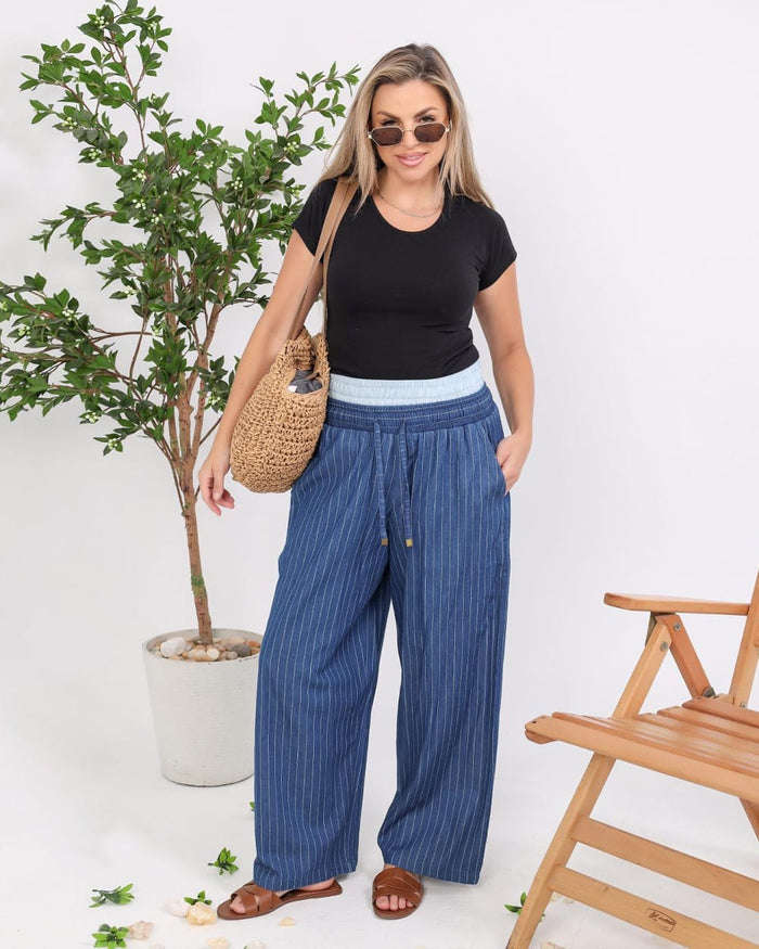 Step out in style with our chic striped pants