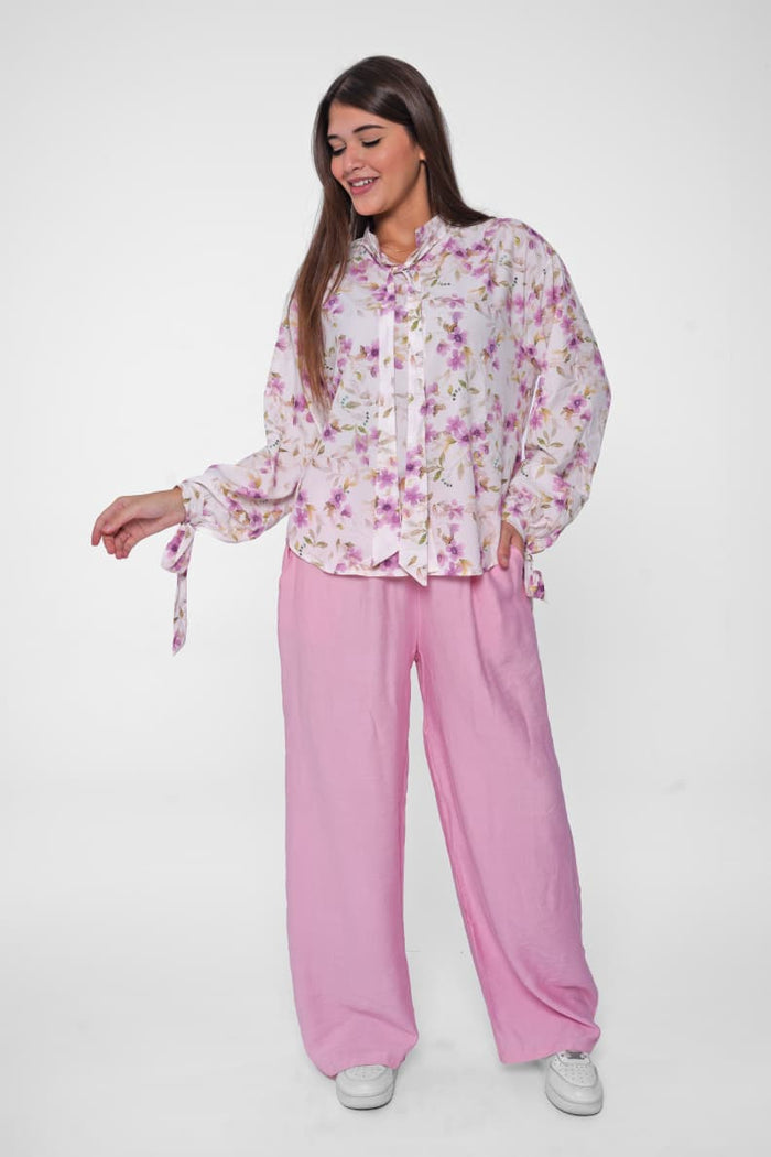 Flawless prints meet satin luxury in one blouse