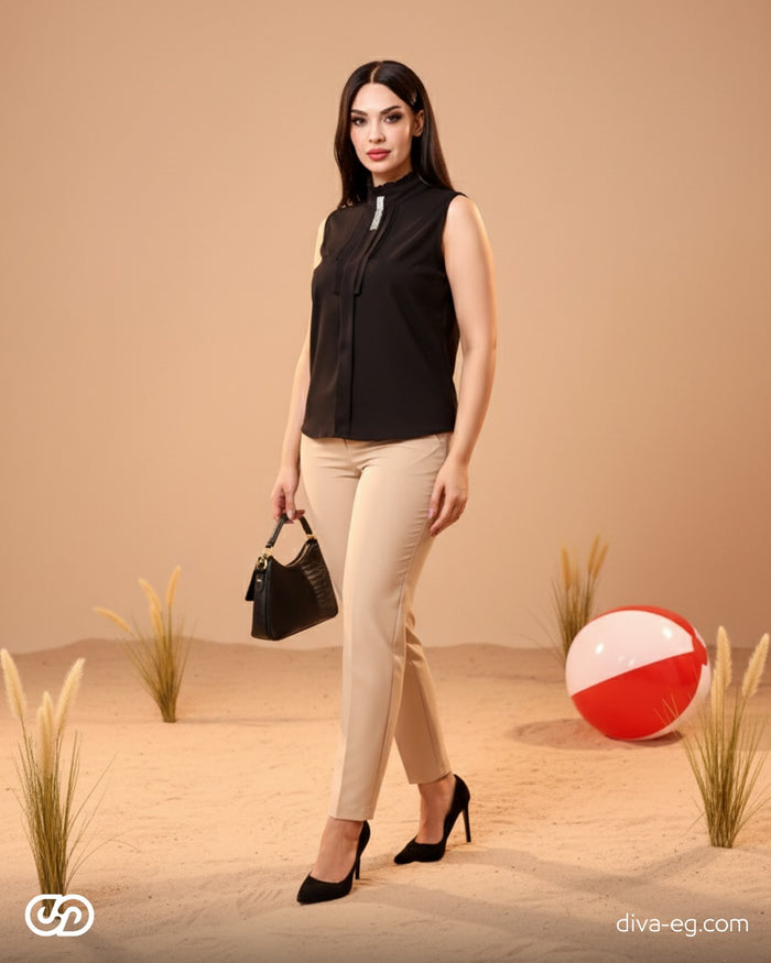 Add a feminine touch with this ruffled blouse