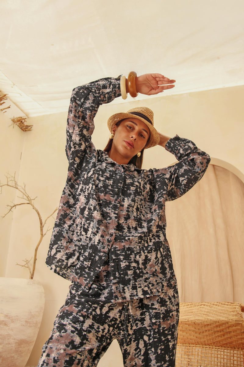 A summer suit, and the print tells the story
