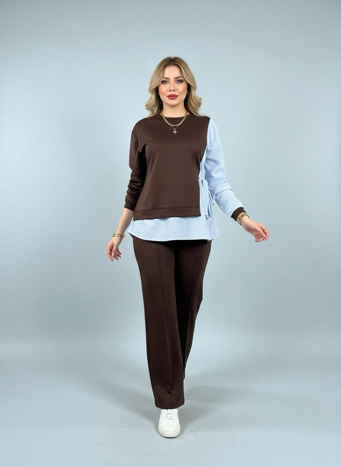Elevate your style with our striped suit featuring chic plain details