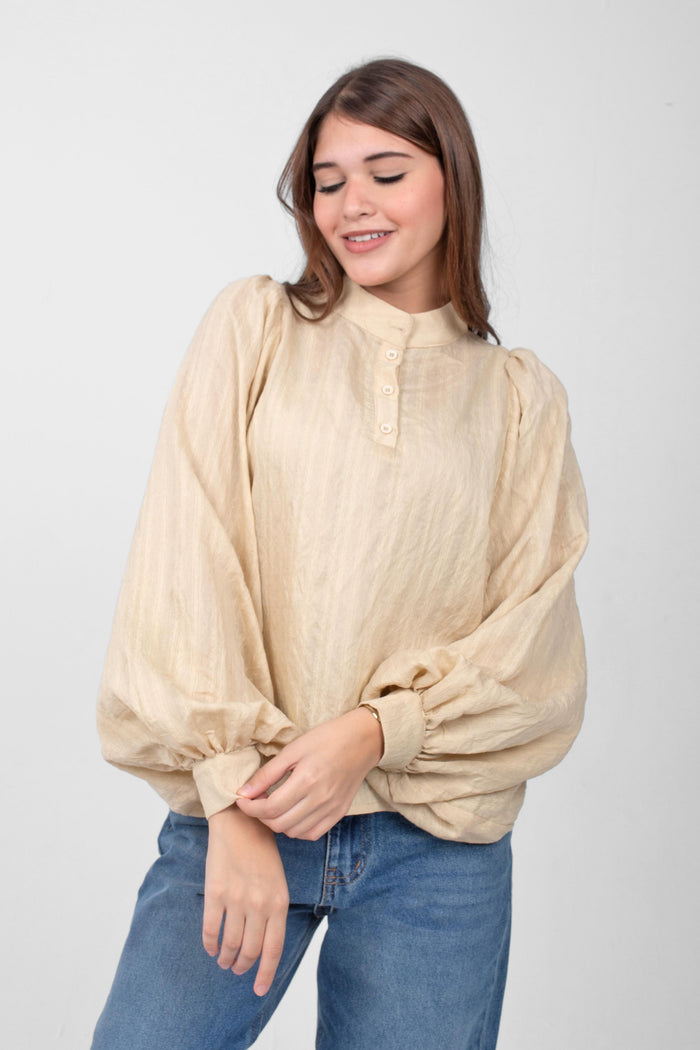 Flow in style with this wide-sleeve linen blouse